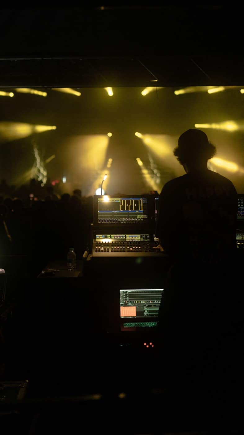 Front-of-house engineer at the desk during a show
